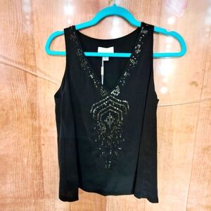 The Korner black v-neck blouse size XS